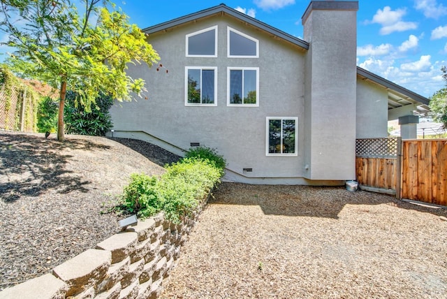280 Park St, Concord, CA 94520 - back of property featuring stucco siding, crawl space, fence, and a chimney