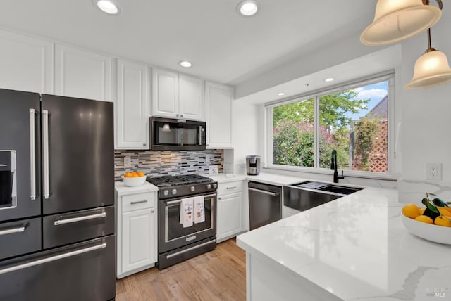 280 Park St, Concord, CA 94520 - kitchen featuring stainless steel appliances, a sink, white cabinetry, recessed lighting, and tasteful backsplash