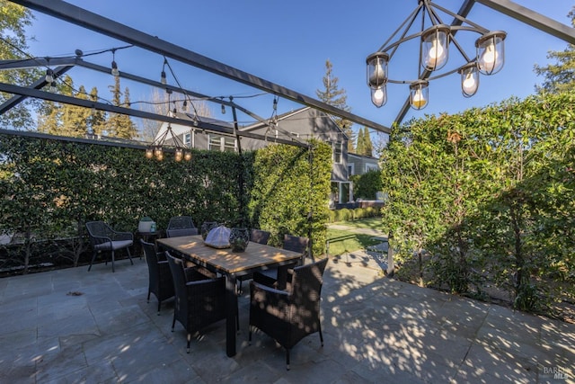 view of patio featuring outdoor dining space
