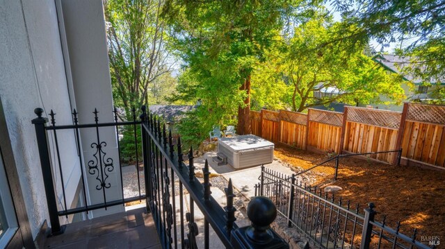 exterior space featuring a fenced backyard and a patio