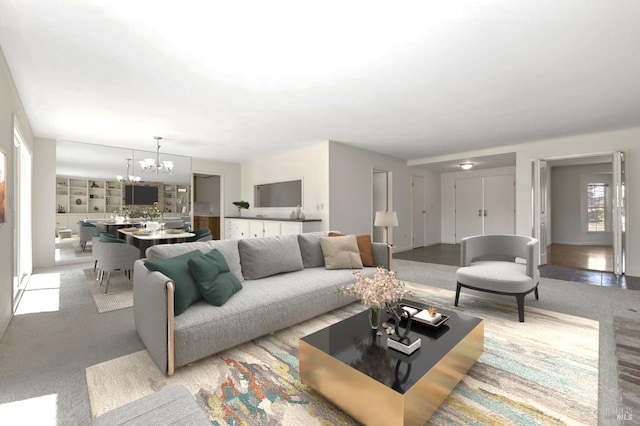 living room featuring carpet floors and a chandelier