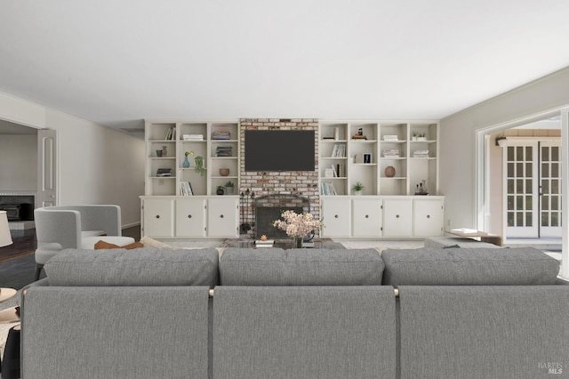 living area featuring a fireplace