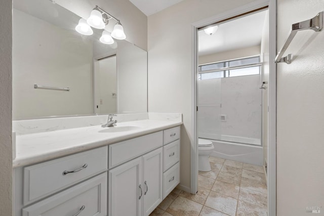 full bathroom with toilet, vanity, and bath / shower combo with glass door