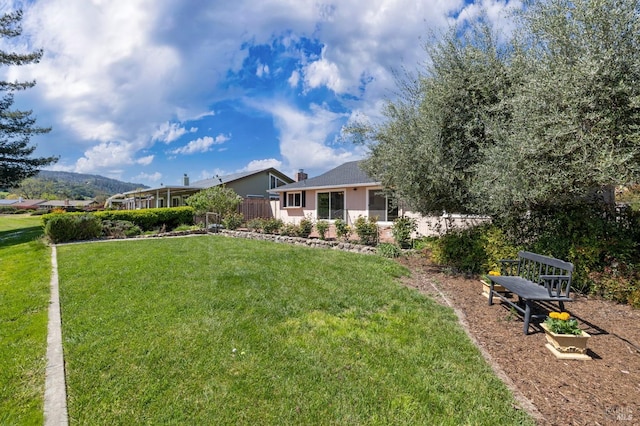 view of yard with fence