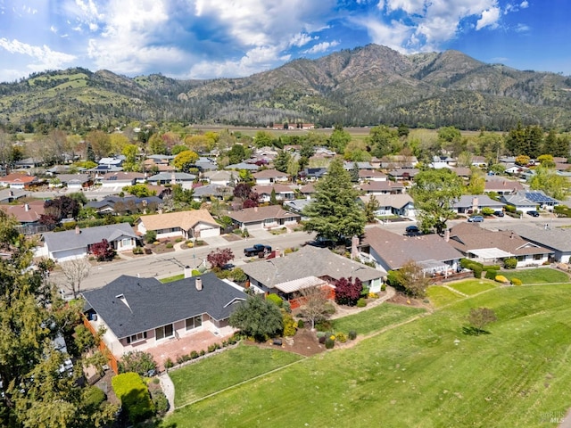 bird's eye view with a residential view and a mountain view