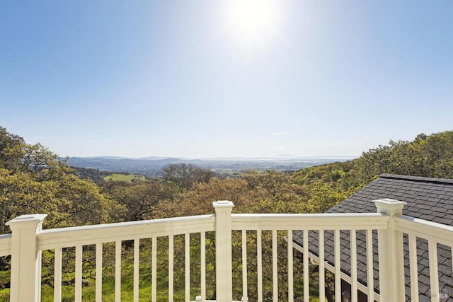 balcony with a forest view