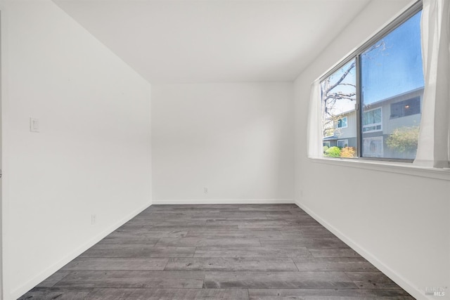 1008 Los Gamos Rd Unit F, San Rafael, CA 94903 - unfurnished room featuring wood finished floors and baseboards