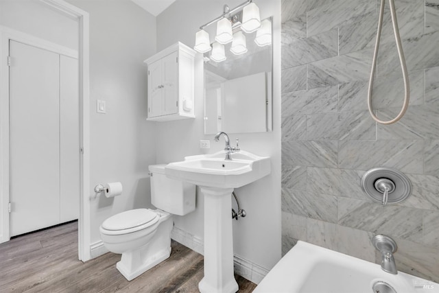 1008 Los Gamos Rd Unit F, San Rafael, CA 94903 - bathroom with toilet, wood finished floors, and a sink