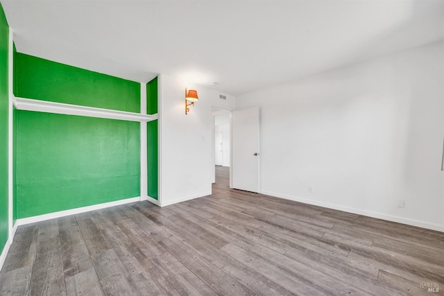 1008 Los Gamos Rd Unit F, San Rafael, CA 94903 - empty room with wood finished floors and baseboards