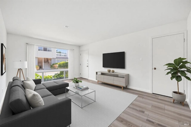 1008 Los Gamos Rd Unit F, San Rafael, CA 94903 - living area with light wood-style flooring and baseboards