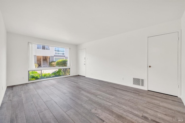 1008 Los Gamos Rd Unit F, San Rafael, CA 94903 - empty room featuring wood finished floors and baseboards