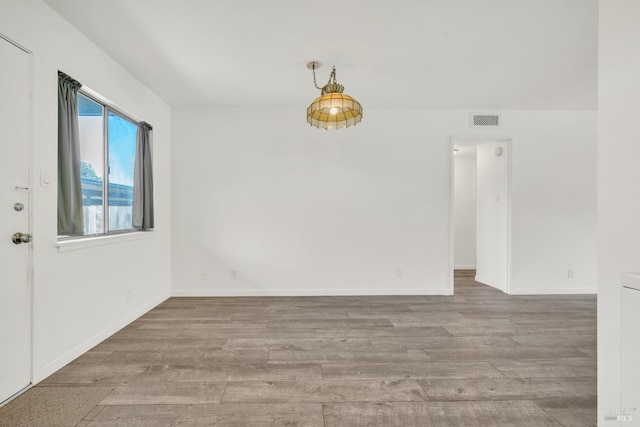 1008 Los Gamos Rd Unit F, San Rafael, CA 94903 - unfurnished room featuring wood finished floors and baseboards