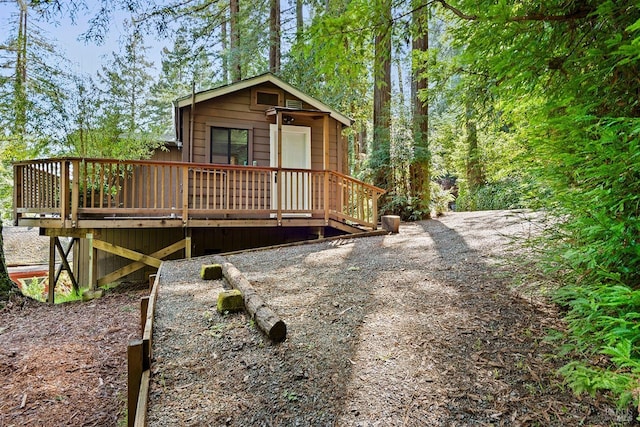 back of property with a deck
