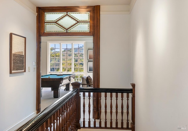 interior space featuring billiards and crown molding