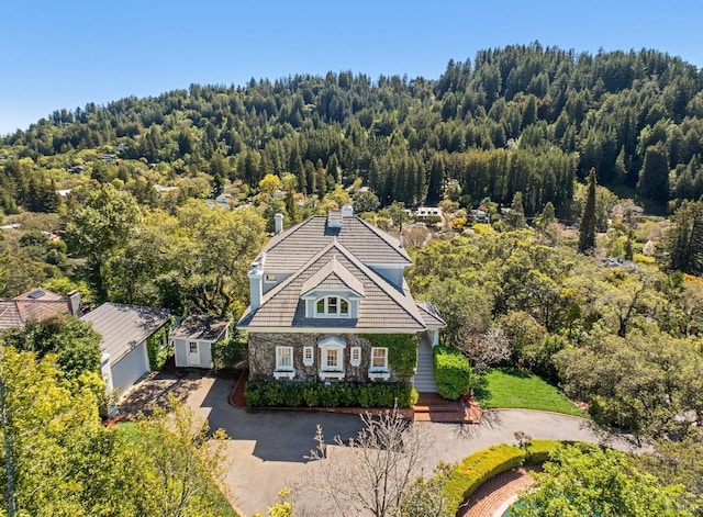 aerial view featuring a forest view