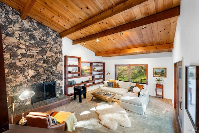 living area featuring wood ceiling, carpet floors, a stone fireplace, and vaulted ceiling with beams