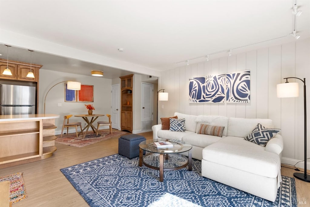262 Larkspur Plaza Dr, Larkspur, CA 94939 - living room featuring wood finished floors, baseboards, and rail lighting