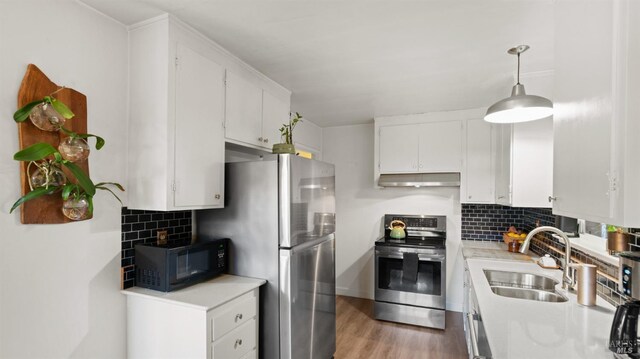 317 Olema Rd, Fairfax, CA 94930 - kitchen featuring appliances with stainless steel finishes, a sink, light countertops, and white cabinets