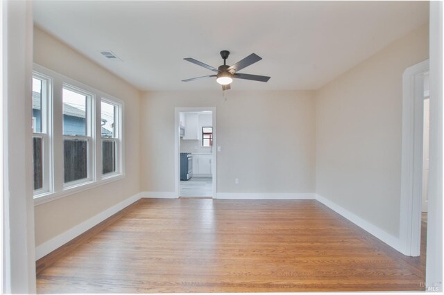 308 Central Ave, Vallejo, CA 94590 - unfurnished room with a ceiling fan, baseboards, visible vents, and wood finished floors