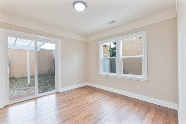 308 Central Ave, Vallejo, CA 94590 - unfurnished room featuring visible vents, baseboards, and wood finished floors