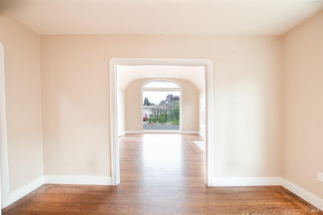 308 Central Ave, Vallejo, CA 94590 - interior space featuring baseboards, arched walkways, and wood finished floors