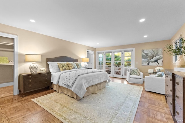 bedroom with recessed lighting, french doors, and access to outside