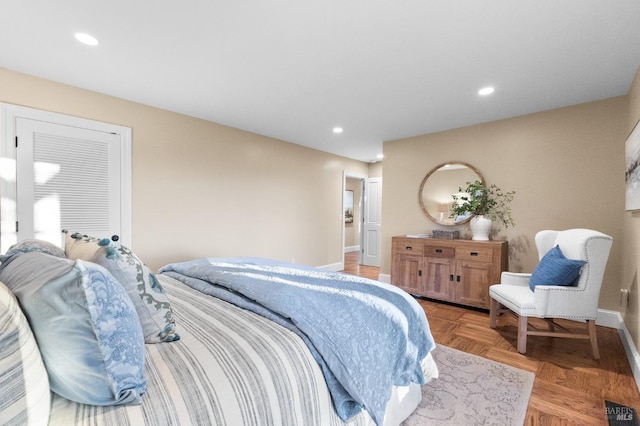 bedroom featuring baseboards and recessed lighting