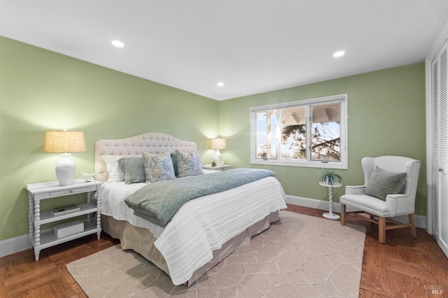 bedroom with a closet, baseboards, and recessed lighting