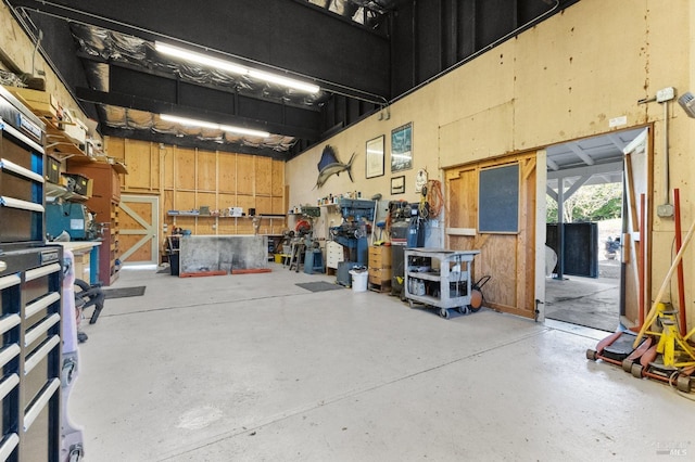 garage with a workshop area