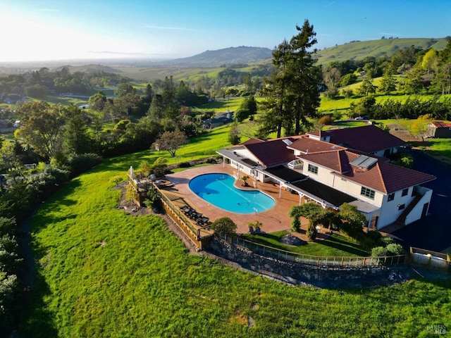 drone / aerial view featuring a mountain view