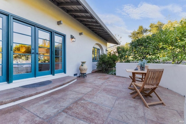 view of patio / terrace featuring french doors