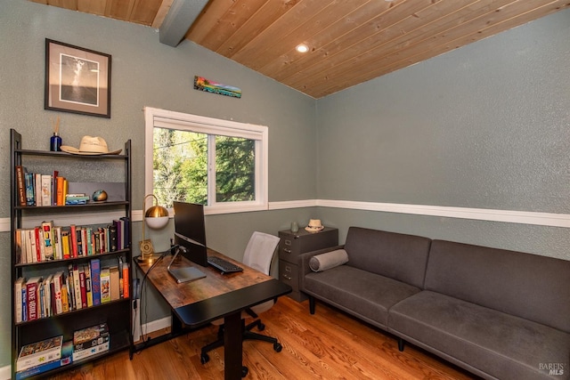 office space with vaulted ceiling with beams, wood finished floors, and wooden ceiling