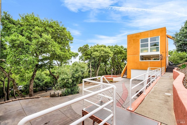 view of patio / terrace with stairway