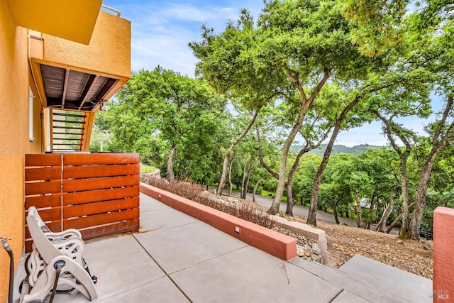 view of patio / terrace featuring a mountain view