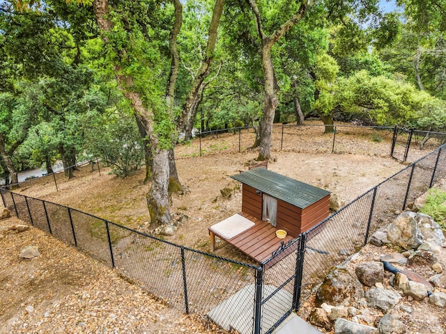 view of property's community with fence