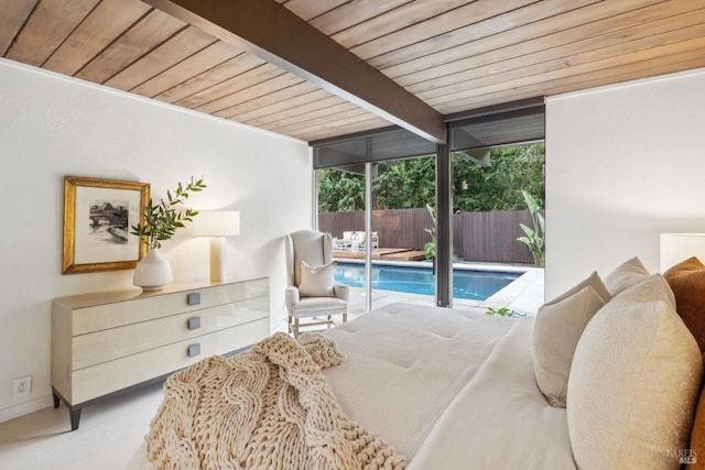 bedroom featuring a wall of windows, wooden ceiling, baseboards, beam ceiling, and access to exterior