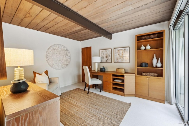 office space with light carpet, wooden ceiling, and beam ceiling