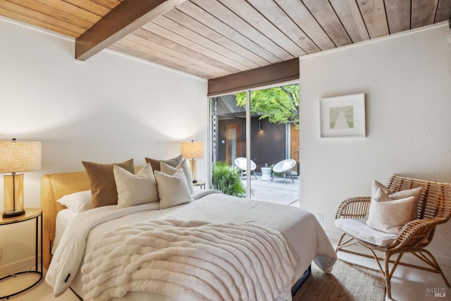 bedroom with beam ceiling, wood ceiling, and access to outside