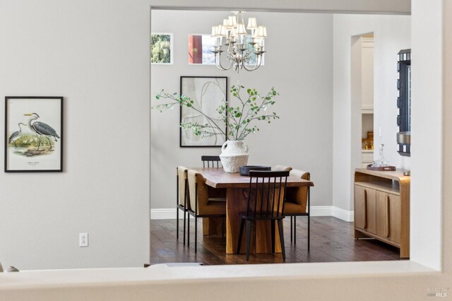 5232 Sunridge Dr, Fairfield, CA 94534 - dining space featuring a chandelier, baseboards, and dark wood-style floors