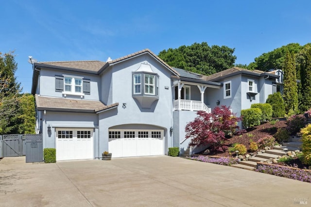 5232 Sunridge Dr, Fairfield, CA 94534 - view of front of property with concrete driveway, stucco siding, a gate, a garage, and fence