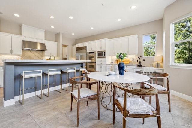 5232 Sunridge Dr, Fairfield, CA 94534 - dining room featuring light tile patterned floors, baseboards, and recessed lighting