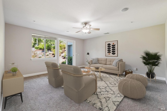 5232 Sunridge Dr, Fairfield, CA 94534 - living area featuring visible vents, ceiling fan, carpet, and baseboards