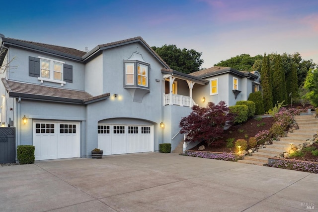 5232 Sunridge Dr, Fairfield, CA 94534 - view of front of home featuring concrete driveway, stucco siding, a garage, and stairs