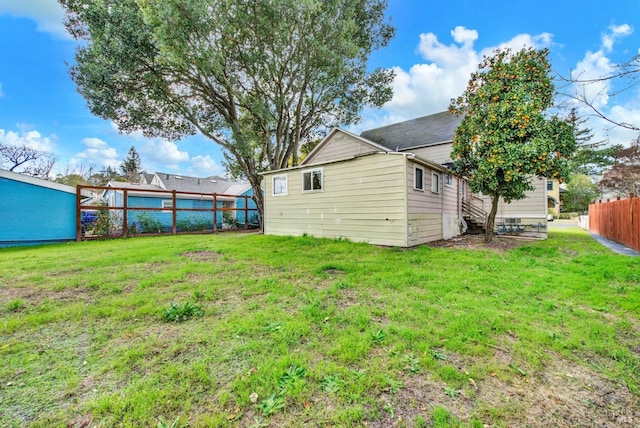 view of yard featuring fence