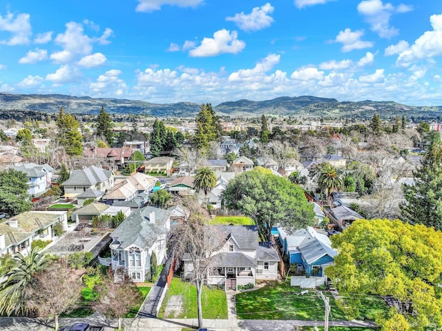drone / aerial view with a residential view and a mountain view