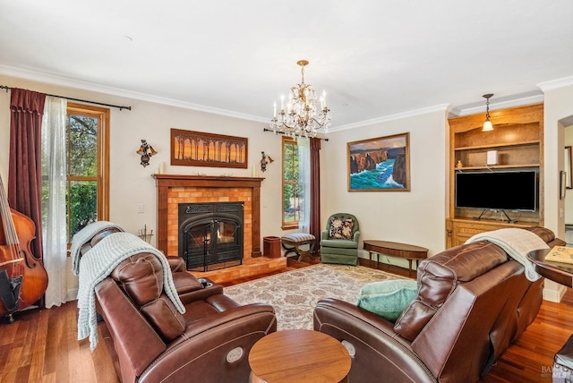 11900 Hwy 116, Guerneville, CA 95446 - living area with crown molding, built in features, wood finished floors, and a notable chandelier