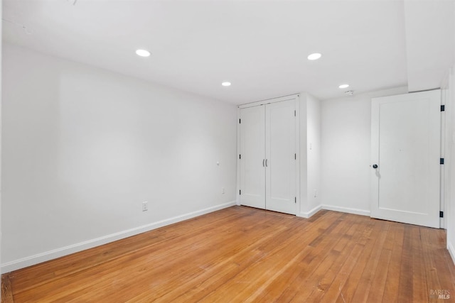 162 Wolfe Grade, Kentfield, CA 94904 - unfurnished bedroom with baseboards, light wood-style floors, recessed lighting, and a closet