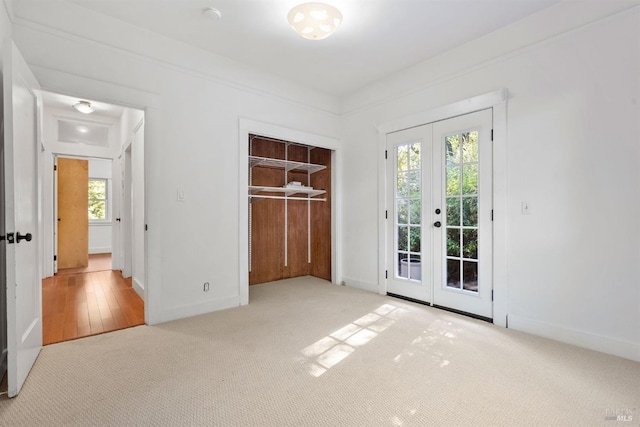 162 Wolfe Grade, Kentfield, CA 94904 - unfurnished bedroom with french doors, carpet floors, access to exterior, and baseboards