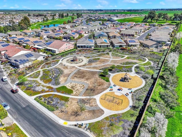 aerial view with a water view and a residential view