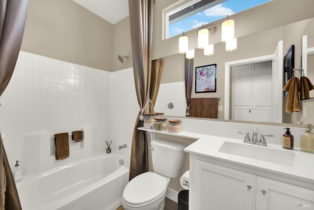 bathroom with toilet, vanity, and shower / bathtub combination with curtain